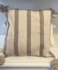 Coussin à pompon rayé en tissu naturel