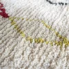 Tapis Béni Ouarain blanc à motifs